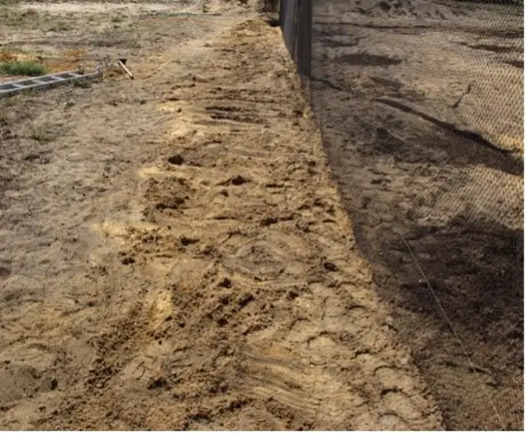 Bird netting buried in trench